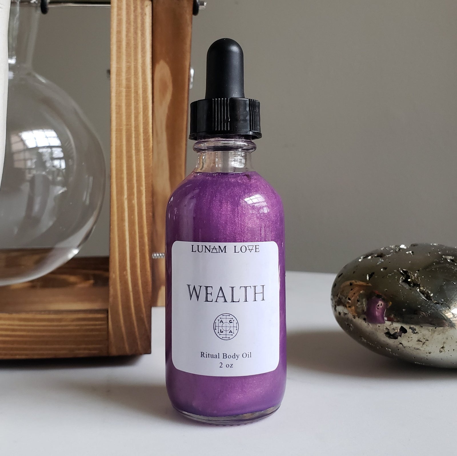 WEALTH BODY OIL